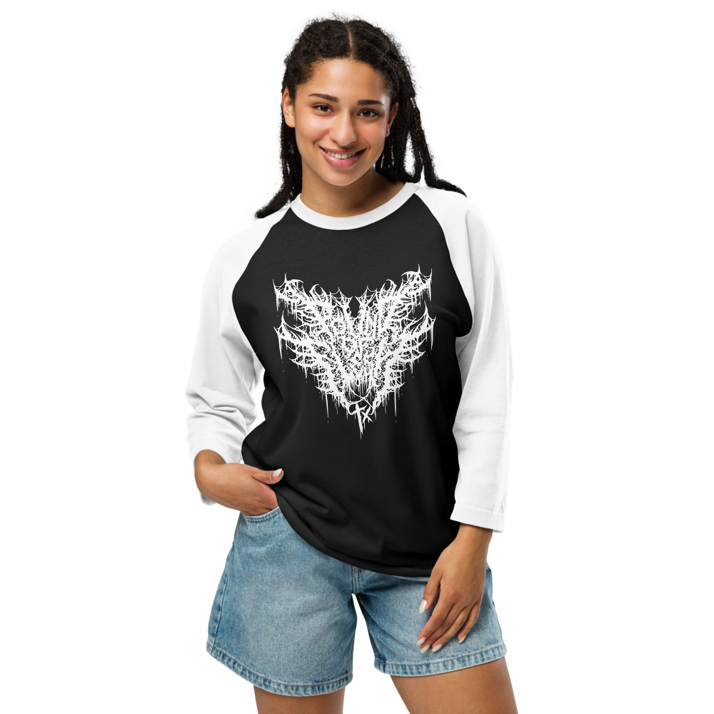 Woman wearing a black shirt with white 3/4 sleeves with the old Pound of Flesh TX logo in white on the front.